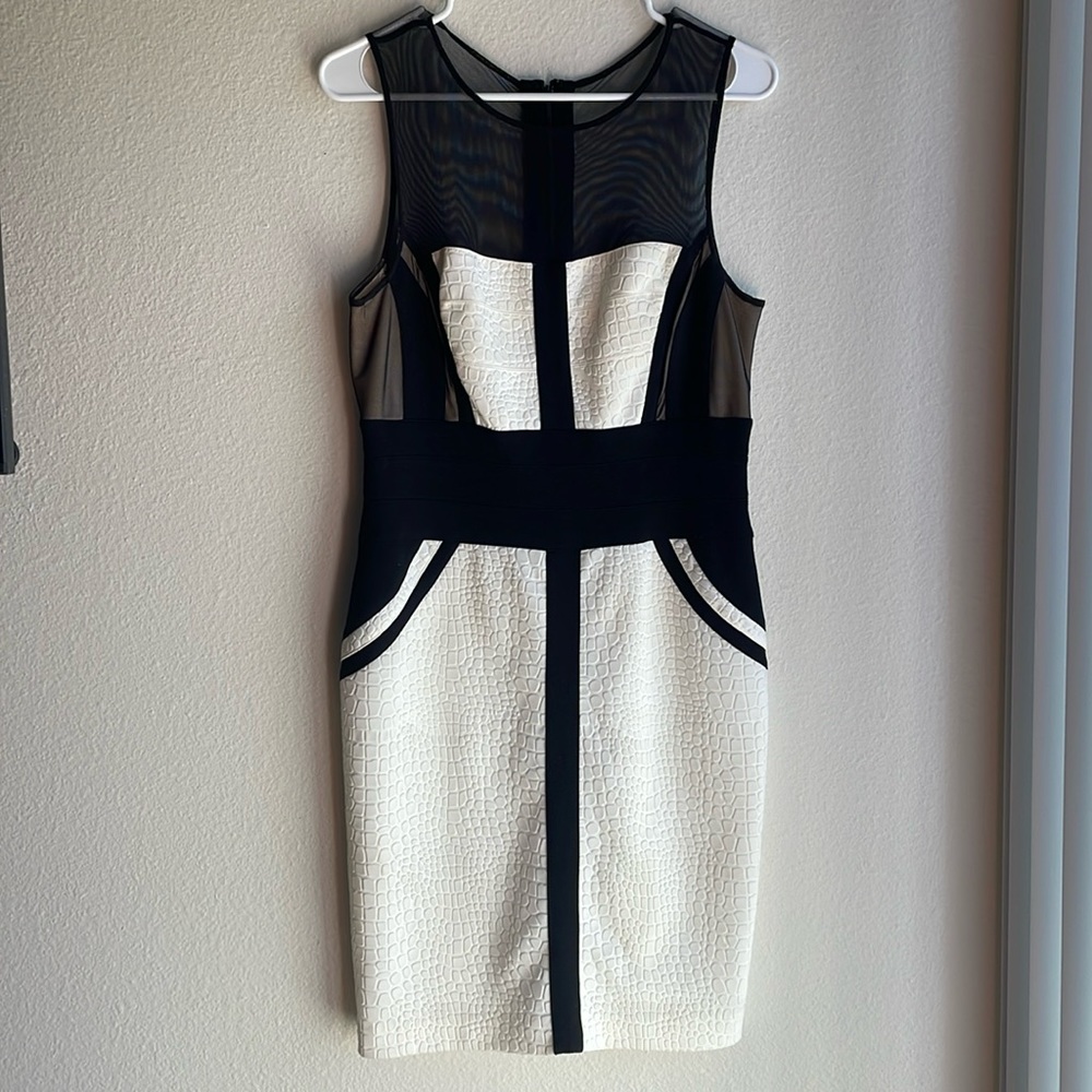 Calf length stretchy fancy dress. Great for a wedding.